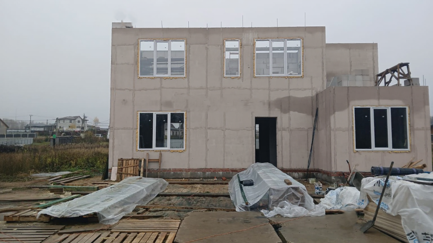 двухэтажный загородный дом из газобетона метров с гаражом и плоской крышей